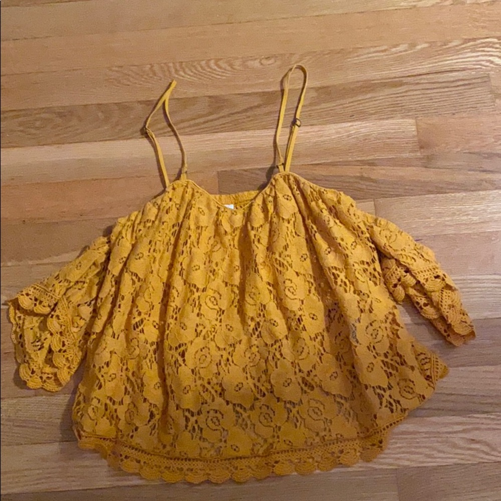 gold tank-top shoulder sleeves